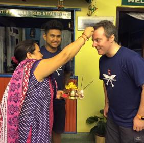 Ashik’s mother applying tikka and wishing me a safe journey home Ashik’s mother applying tikka and wishing me a safe journey home