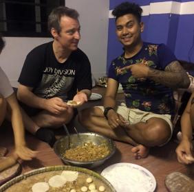 Trying to make Momo with Ashik, but failing miserably, much to his amusement Trying to make Momo with Ashik, but failing miserably, much to his amusement